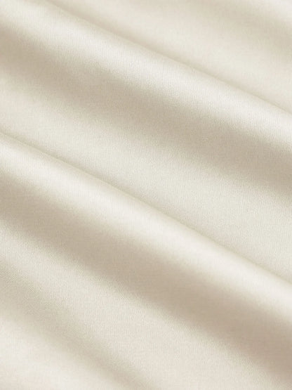 Vestido Maxi A-line con nudo y cuello halter de satén - Crema
