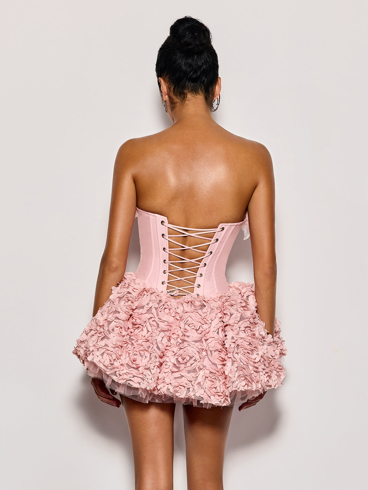 Ulthar | Mini abito rosa senza spalline con applicazione floreale